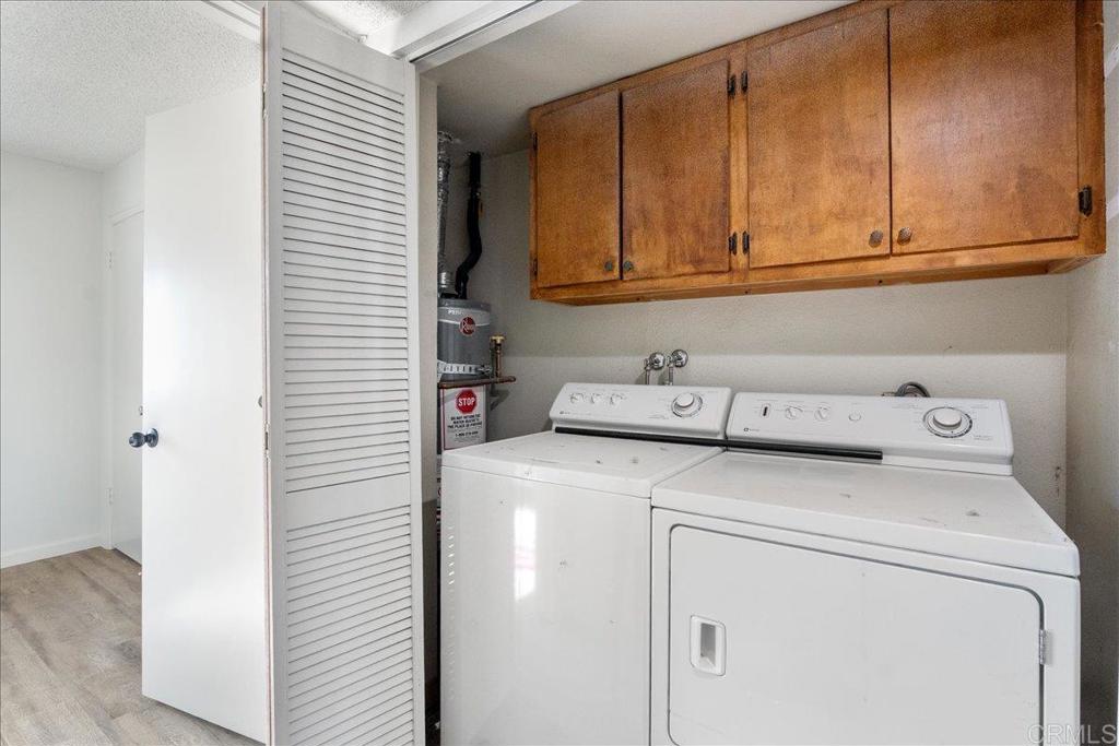 9829 Caspi Gardens Drive, Unit 6 Santee, CA 92071 - Photo 10 of 23 a utility room with dryer and washer