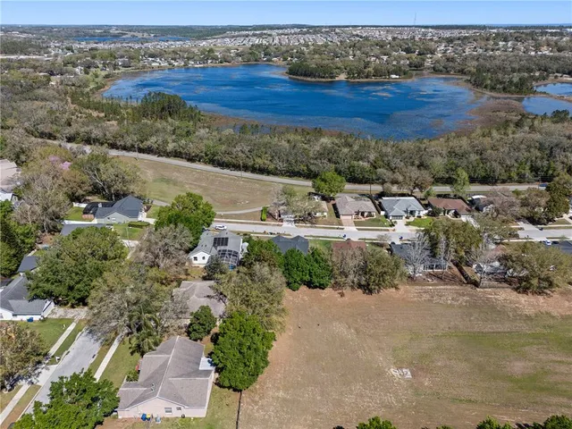 an aerial view of residential house with outdoor space