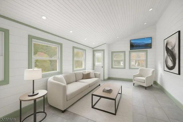 a bed room with a bed and a window