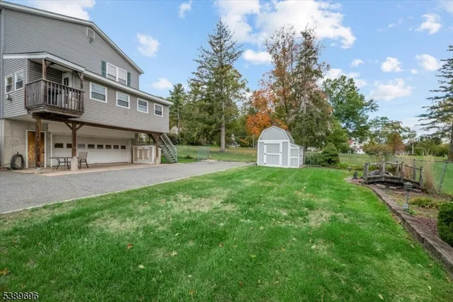 a view of a road with a building in the background