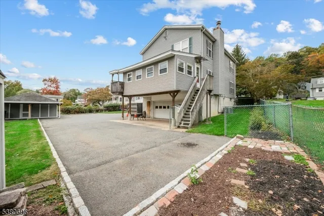 a picture of a bathroom with a shower