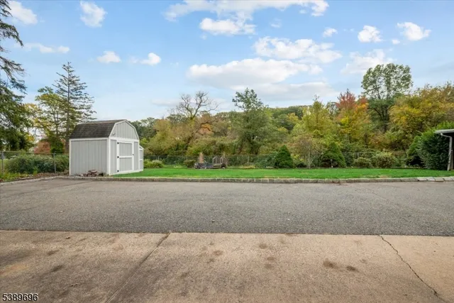 a picture of a bathroom with a shower