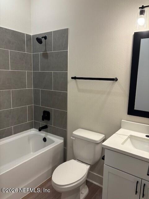 8911 Ford Road Bryceville, FL 32009 - Photo 12 of 15 a white toilet sitting next to a bathroom sink and tub