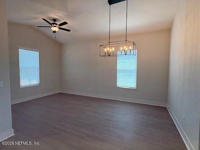 8911 Ford Road Bryceville, FL 32009 - Photo 6 of 15 a view of a room with a chandelier fan and wooden floor