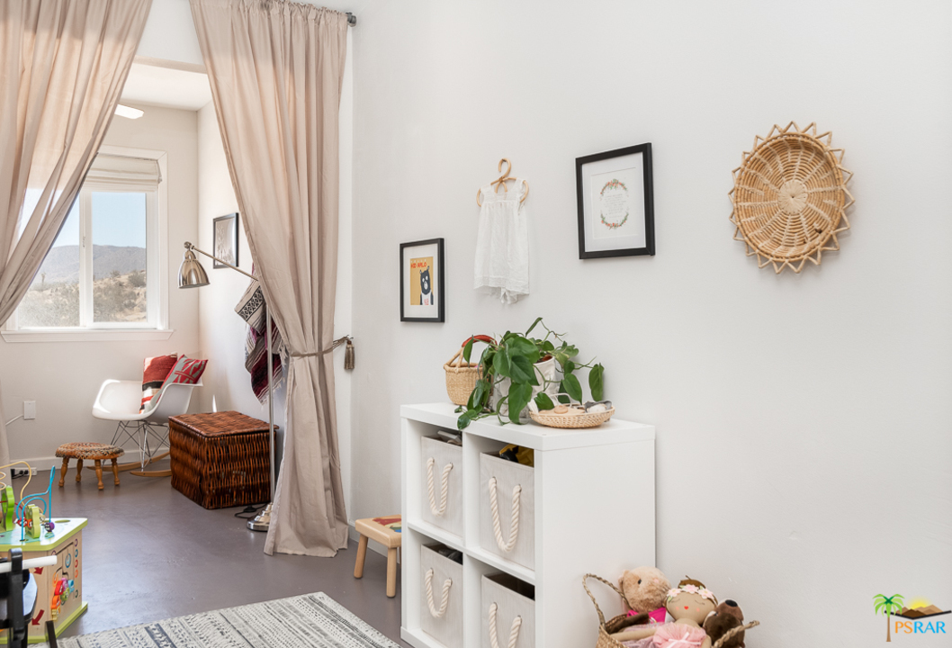 60525 Security Drive Joshua Tree, CA 92252 - Photo 20 of 39 a living room with furniture and a window