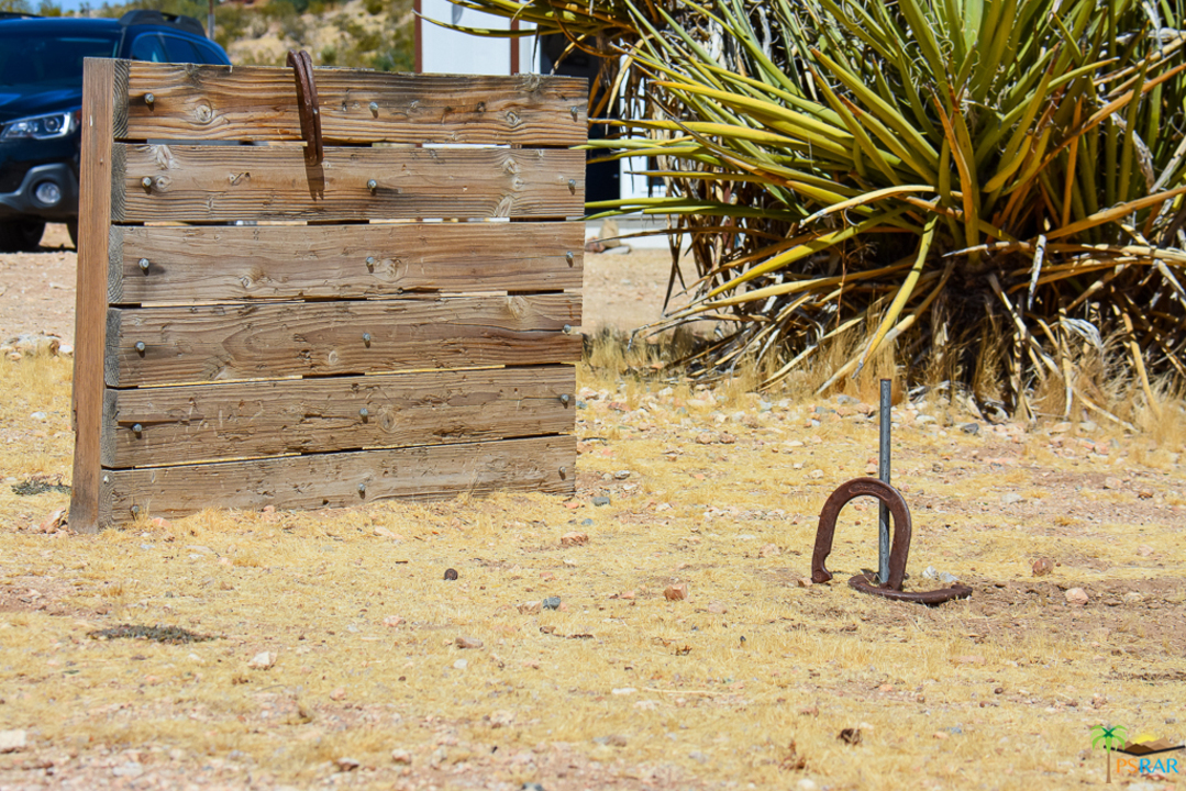 60525 Security Drive Joshua Tree, CA 92252 - Photo 30 of 39 a view of wooden door