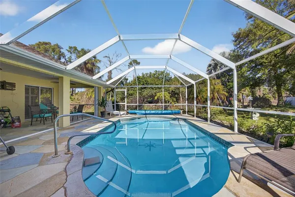 a view of a house with a swimming pool