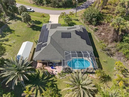 an aerial view of a house with a garden