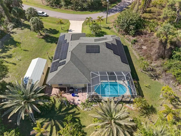 an aerial view of a house with a garden