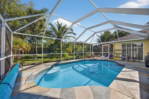 a view of a house with swimming pool