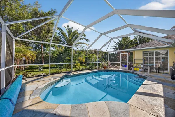 a view of a house with swimming pool