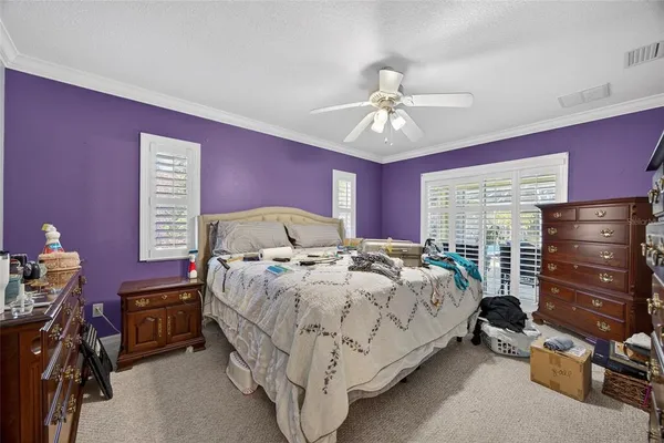 a bedroom with a bed and a closet