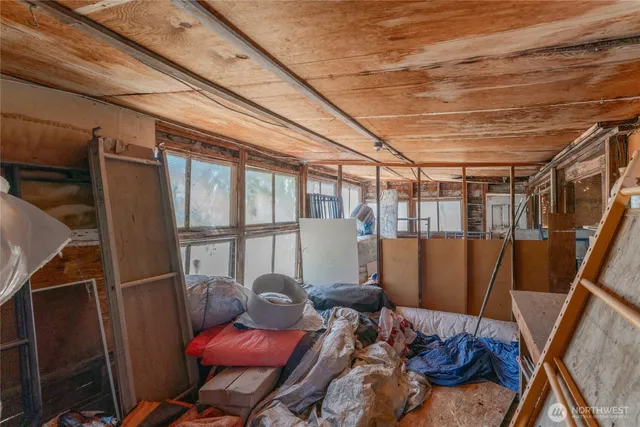 a room with furniture and wooden floor