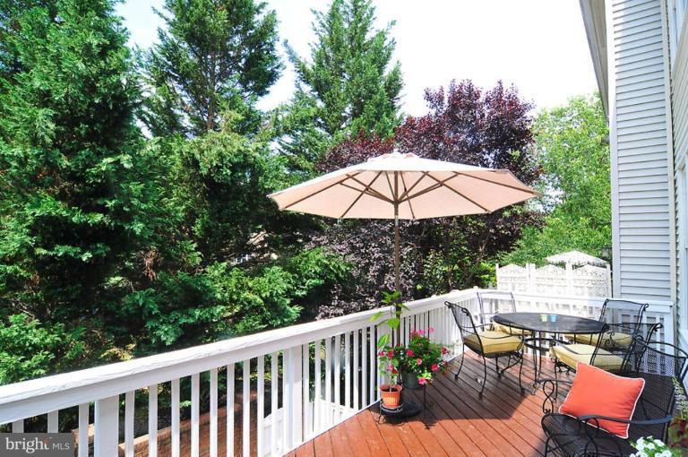 9404 Regency Crest Drive Vienna, VA 22181 - Photo 15 of 30 a view of balcony with outdoor seating and trees