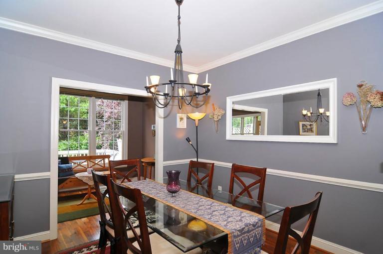 9404 Regency Crest Drive Vienna, VA 22181 - Photo 5 of 30 a view of a dining room with furniture window and outside view