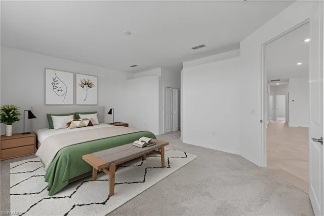 a bathroom with a double vanity sink toilet and shower