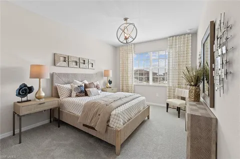 a bed room with a bed and a night stand