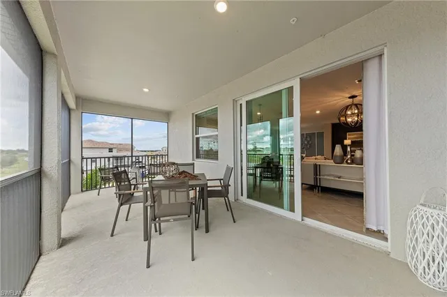 a spacious bathroom with a double vanity sink and a mirror