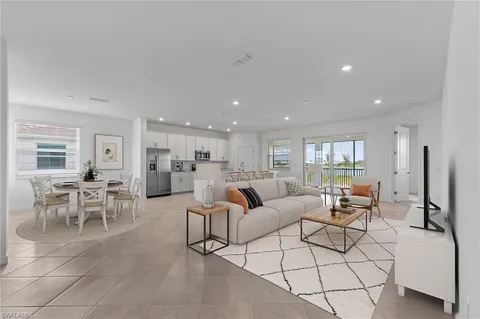 a living room with furniture and a table