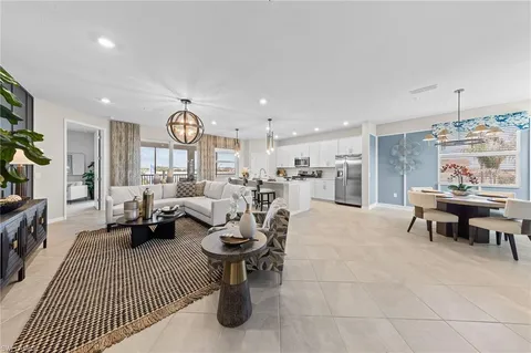 a living room with furniture and a table