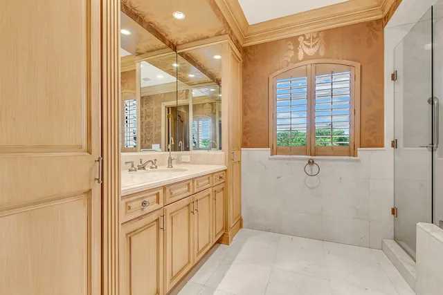 a bathroom with a shower a toilet and a sink