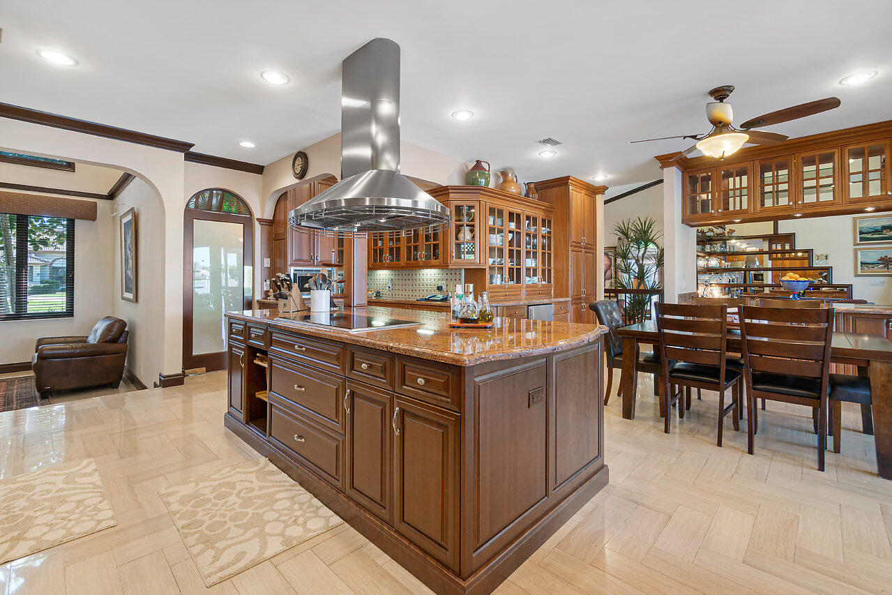4407 Woodfield Boulevard Boca Raton, FL 33434 - Photo 13 of 37 a kitchen with lots of counter top space