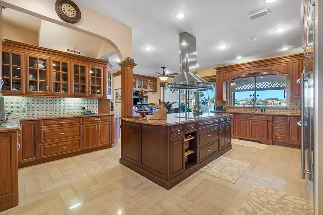 a spacious bedroom with a bed and closet with mirror
