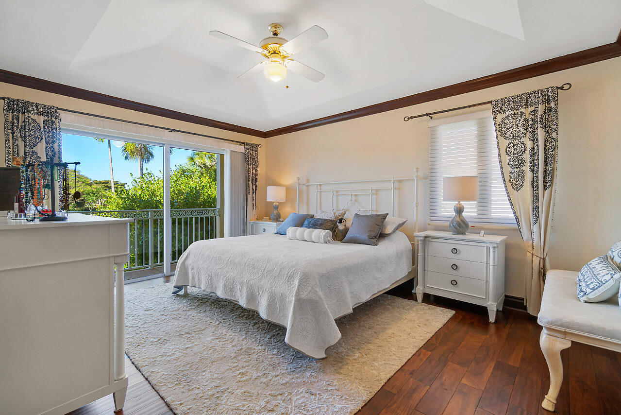 4407 Woodfield Boulevard Boca Raton, FL 33434 - Photo 20 of 37 a bed room with a bed and a window