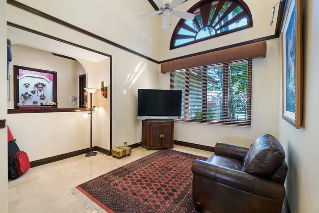 a bathroom with a sink mirror and toilet