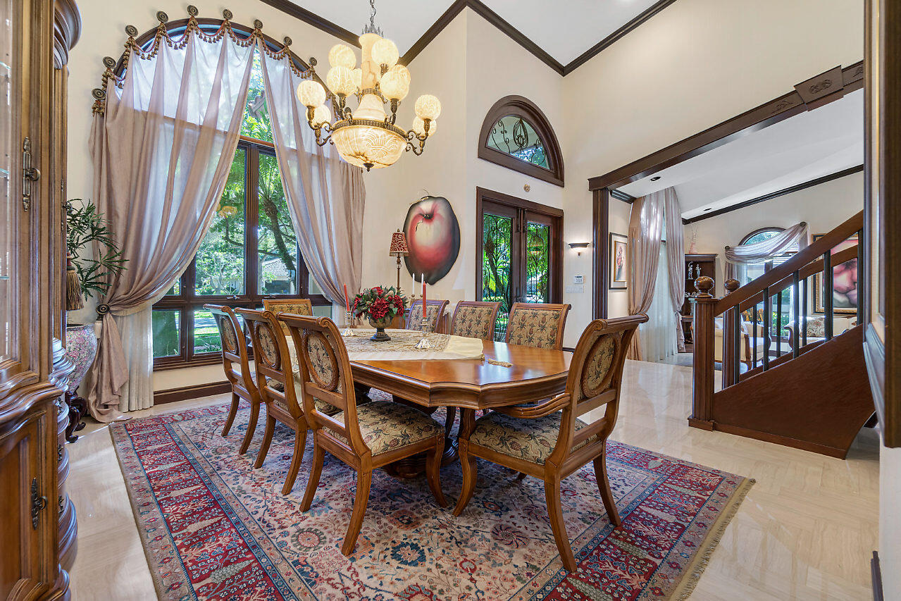 4407 Woodfield Boulevard Boca Raton, FL 33434 - Photo 7 of 37 a view of a dining room with furniture and window