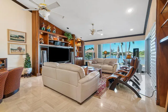 a kitchen with stainless steel appliances granite countertop a stove a sink dishwasher and a refrigerator