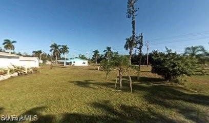 11219 Stringfellow Road Bokeelia, FL 33922 - Photo 3 of 3 a view of a garden