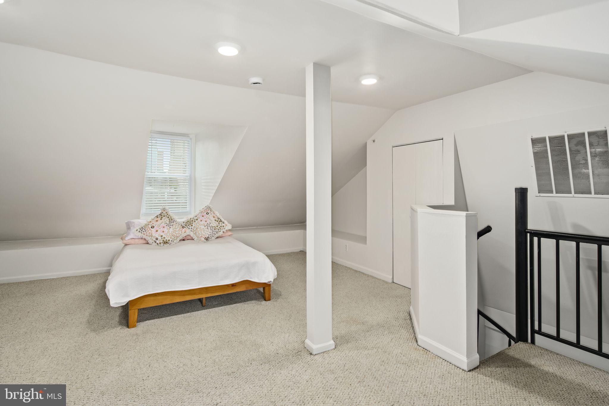 303 South 11th Street, Unit 9 Philadelphia, PA 19107 - Photo 30 of 36 a room with pool table and stairs