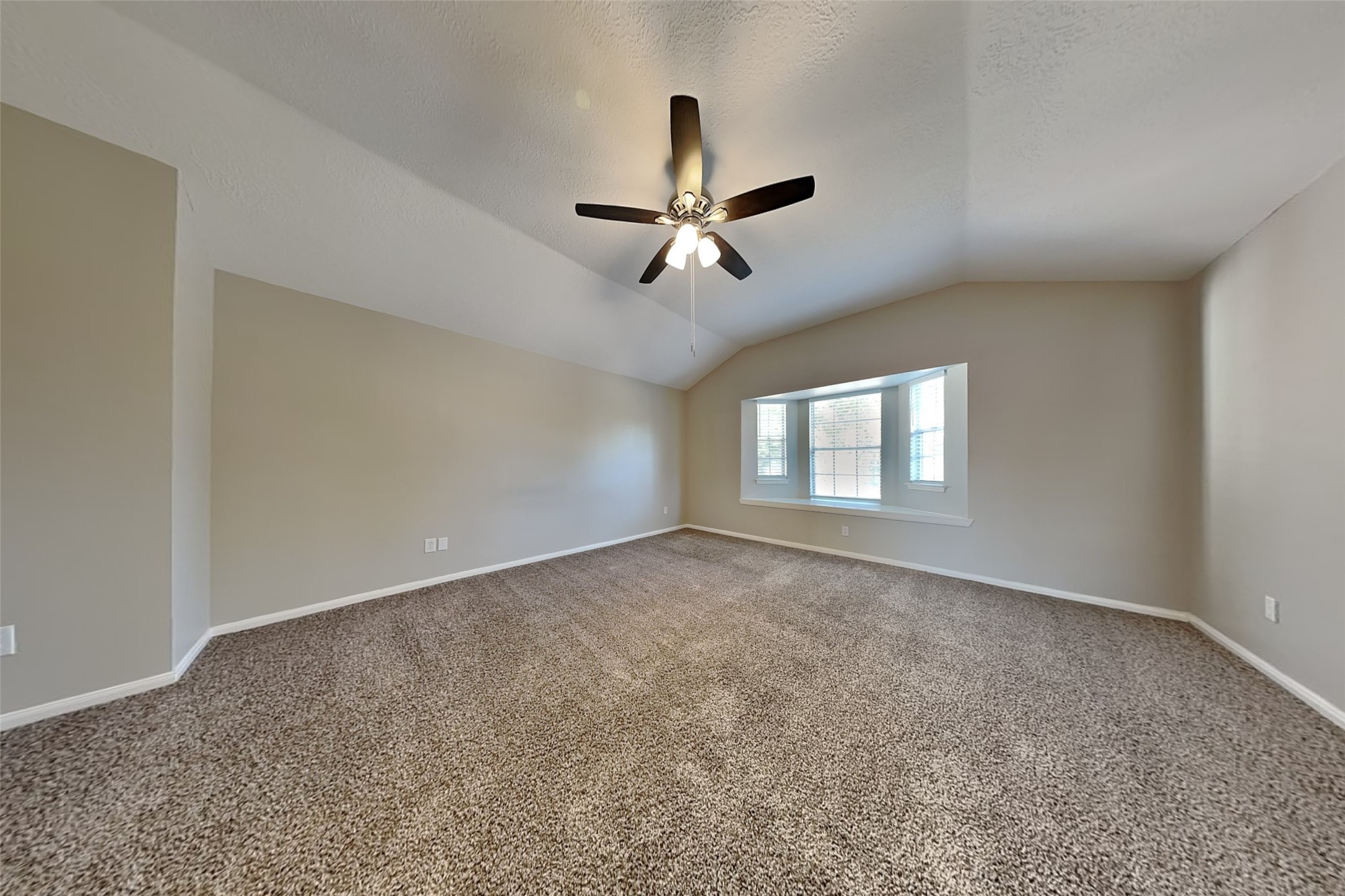 29439 Fox River Drive Spring, TX 77386 - Photo 11 of 29 a view of a room with a ceiling fan and a window