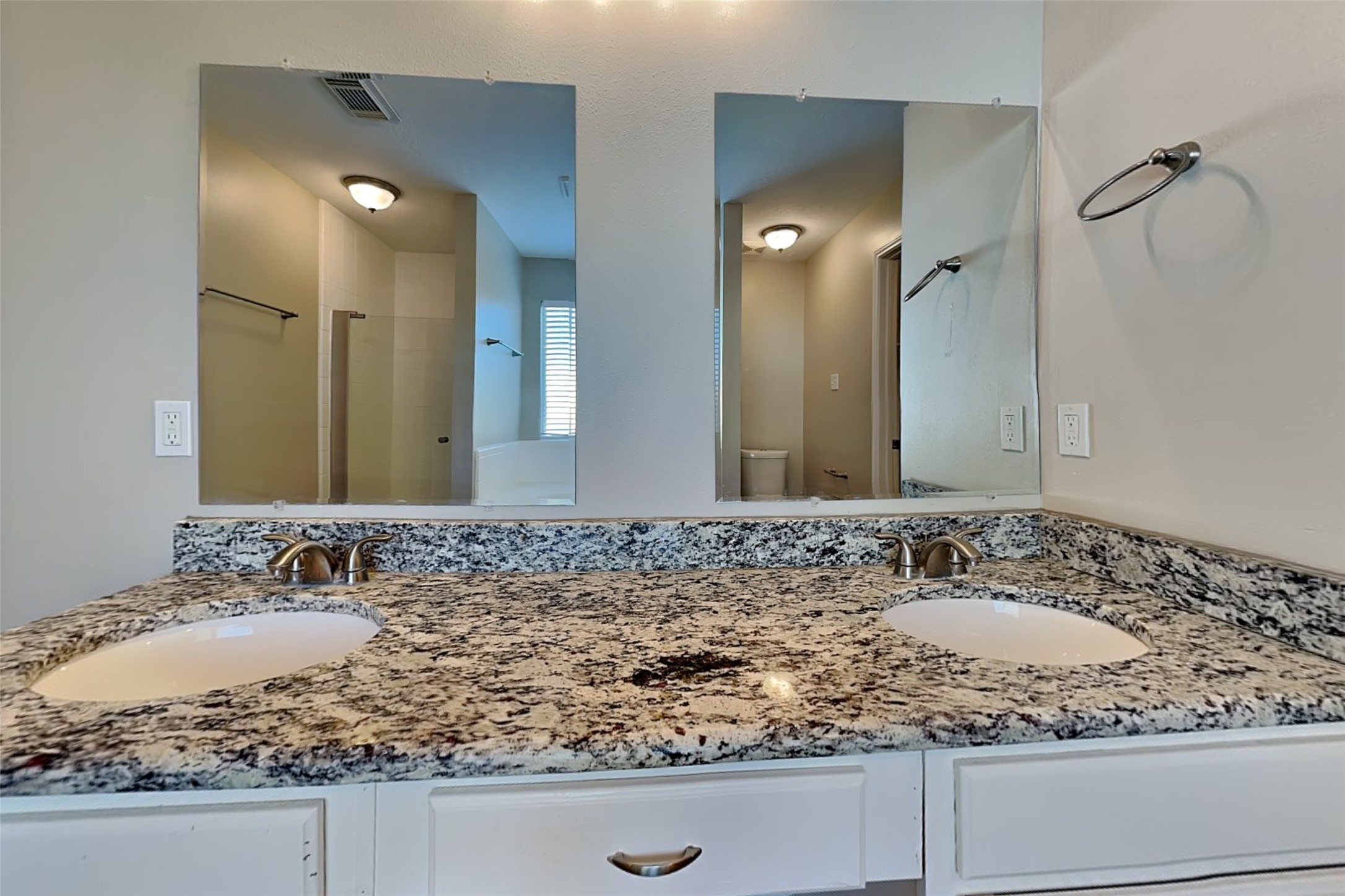 29439 Fox River Drive Spring, TX 77386 - Photo 16 of 29 a bathroom with a granite countertop sink and a mirror