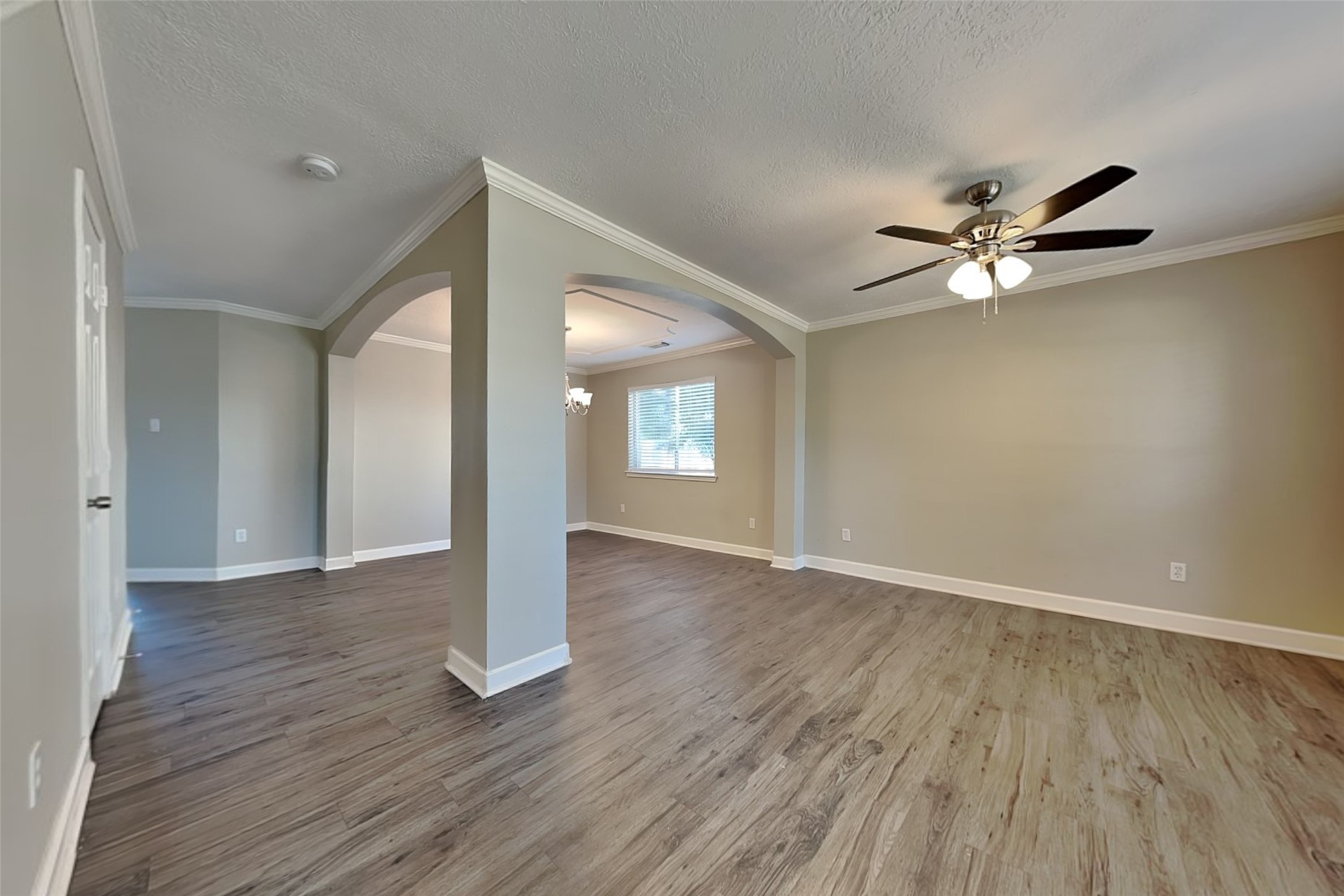 29439 Fox River Drive Spring, TX 77386 - Photo 2 of 29 a view of an empty room with window and wooden floor