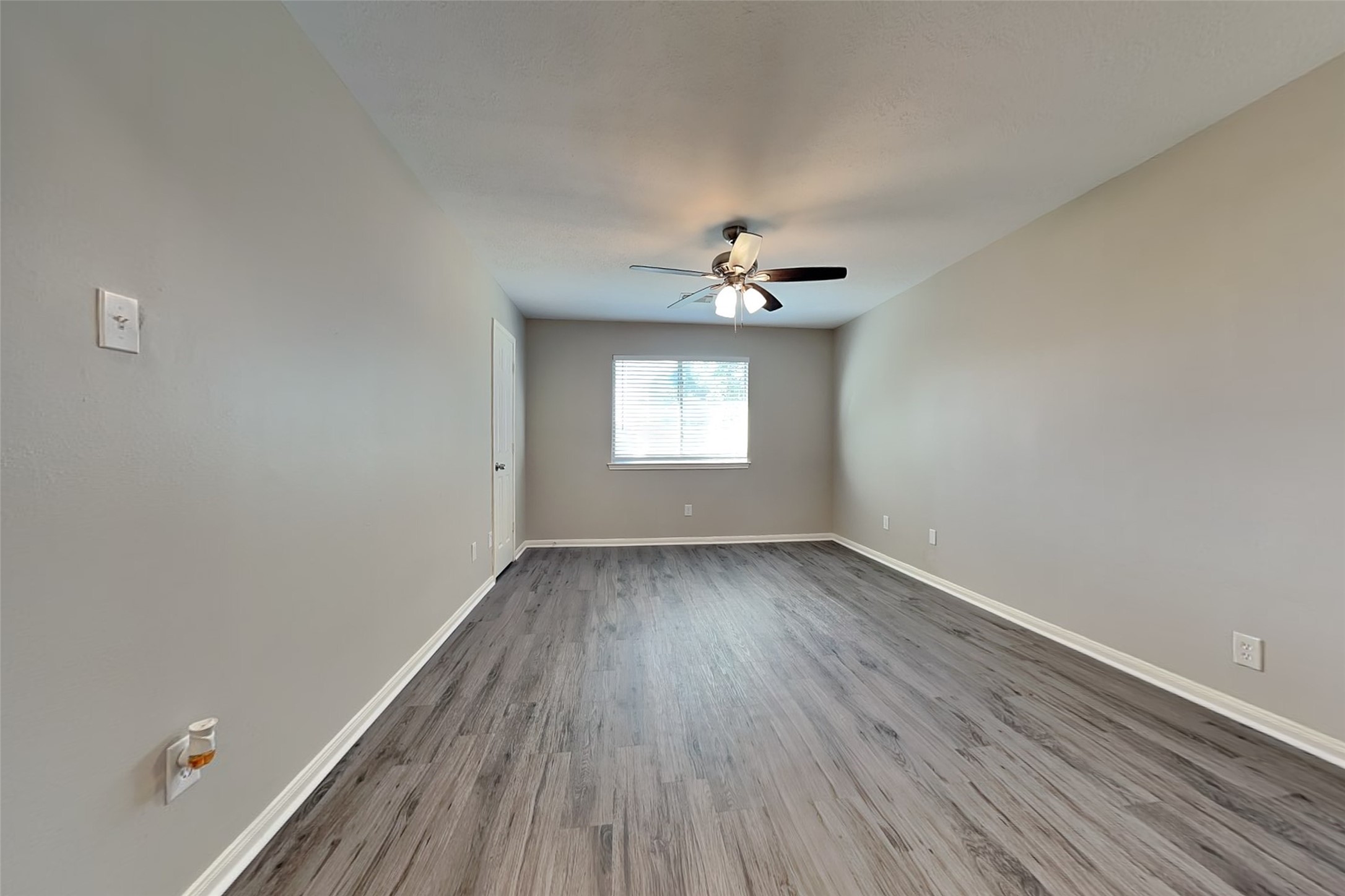 29439 Fox River Drive Spring, TX 77386 - Photo 26 of 29 wooden floor in an empty room with a window