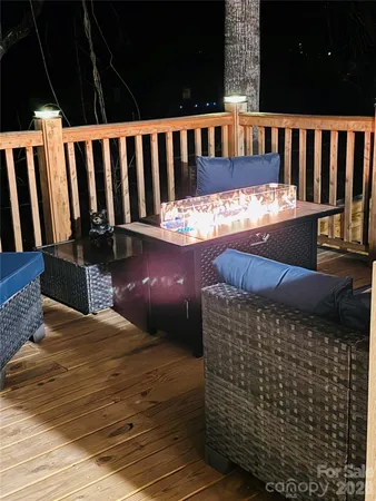 a balcony with wooden floor