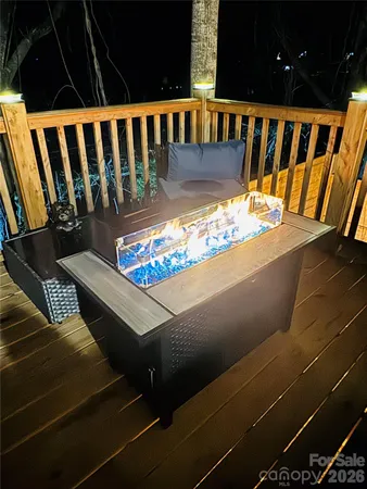 a view of a chairs and table in the balcony