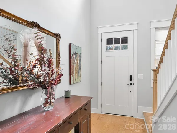 a view of a workspace with furniture