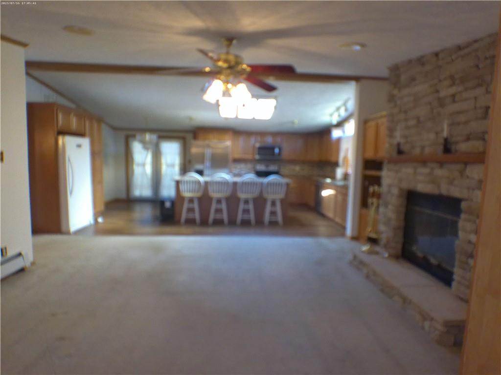107 Hunting Hill Road Dilliner, PA 15327 - Photo 16 of 24 a view of a livingroom with furniture and a fireplace
