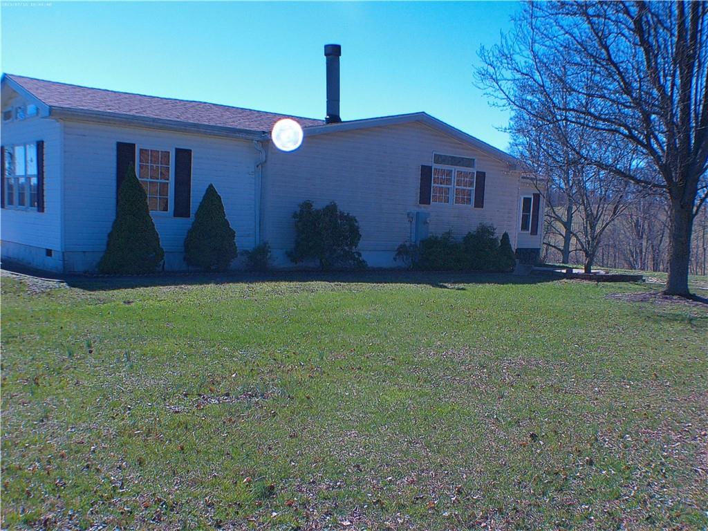 107 Hunting Hill Road Dilliner, PA 15327 - Photo 3 of 24 a view of house with backyard