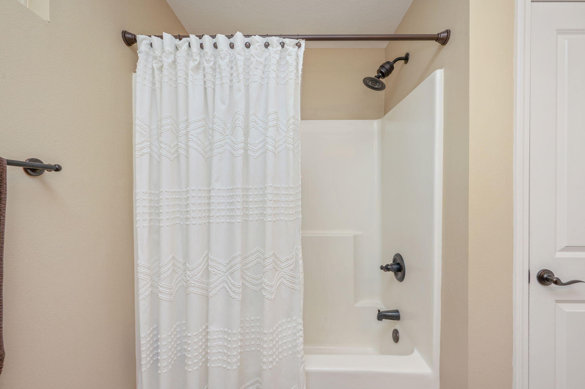 5811 Roberts Road Crestview, FL 32536 - Photo 15 of 17 a bathroom with a shower and a bath tub