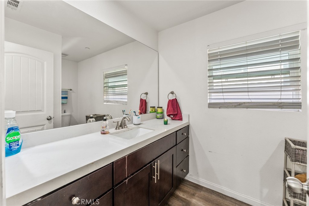 507 Villa Way Colton, CA 92324 - Photo 25 of 34 a bathroom with a sink and a mirror