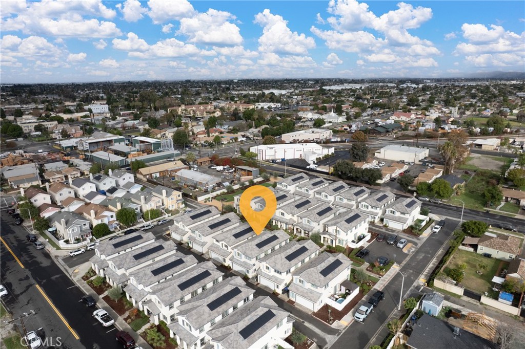 507 Villa Way Colton, CA 92324 - Photo 32 of 34 an aerial view of a residential apartment building with swimming pool