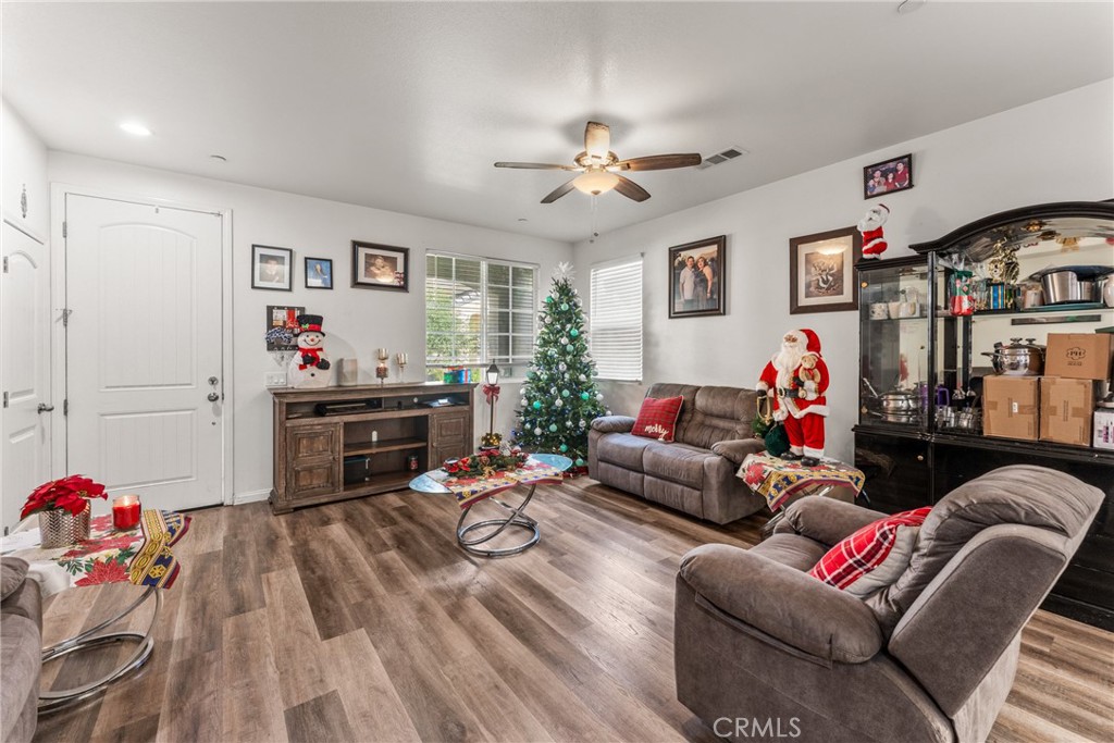 507 Villa Way Colton, CA 92324 - Photo 5 of 34 a living room with furniture and a flat screen tv