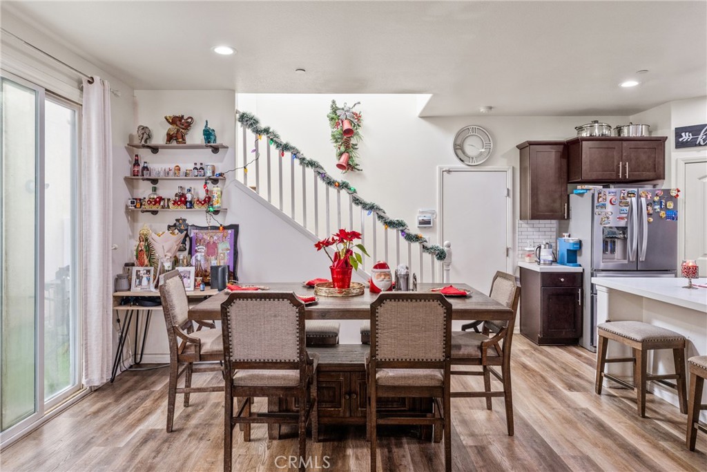 507 Villa Way Colton, CA 92324 - Photo 7 of 34 a view of a dining room with furniture and a kitchen