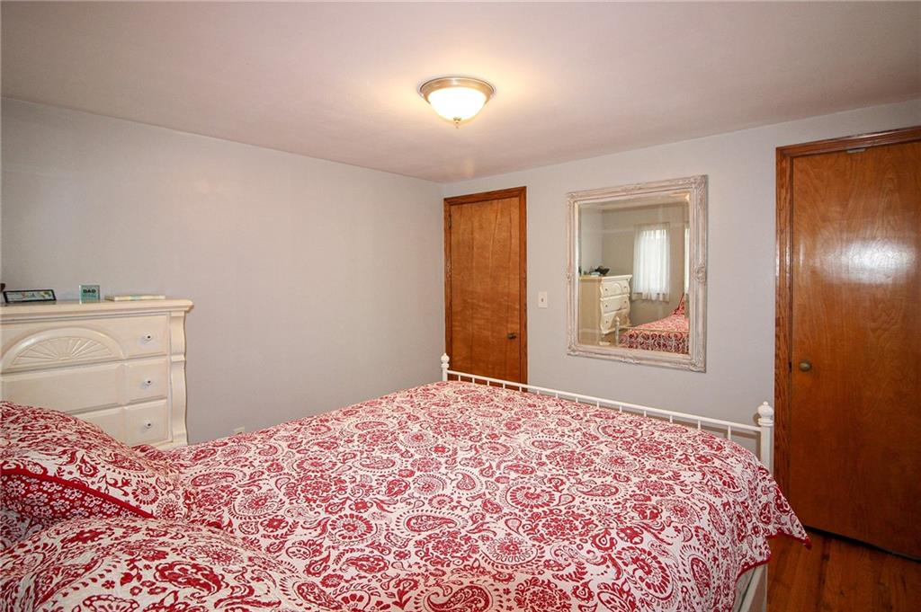 164 Gill Hall Road Clairton, PA 15025 - Photo 12 of 30 a bedroom with a bed and a window