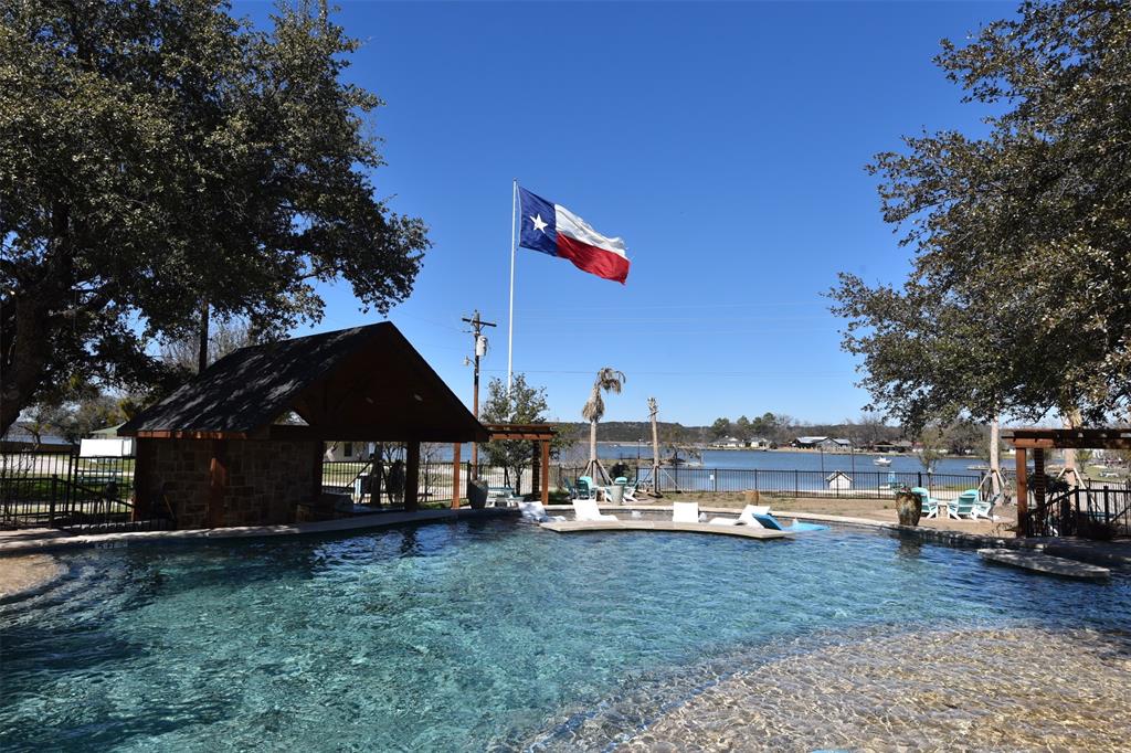 201 Rock Creek Road, Unit 14 Graford, TX 76449 - Photo 16 of 18 a view of outdoor space yard and deck