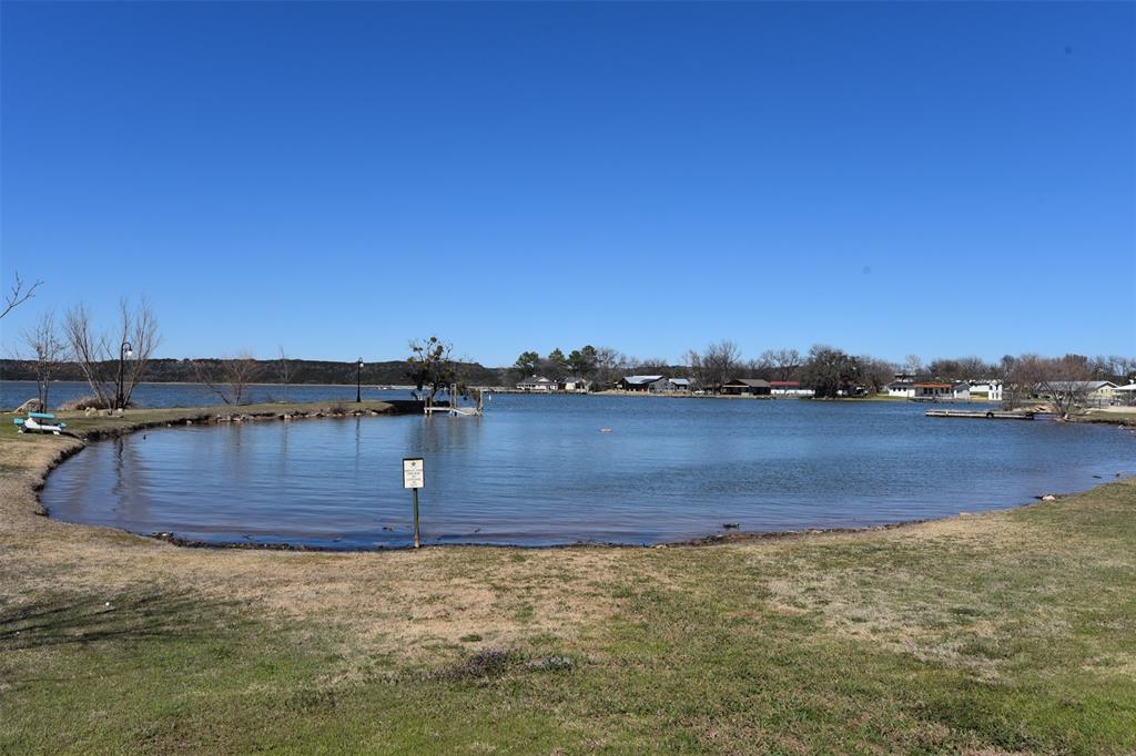 201 Rock Creek Road, Unit 14 Graford, TX 76449 - Photo 18 of 18 a view of a lake
